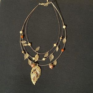 Statement gold fall necklace